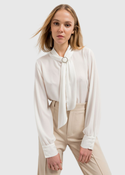 White blouse with a bow