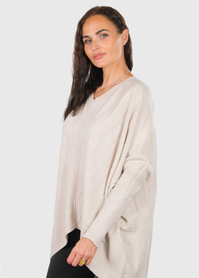 Angela light beige sweater with asymmetric hem